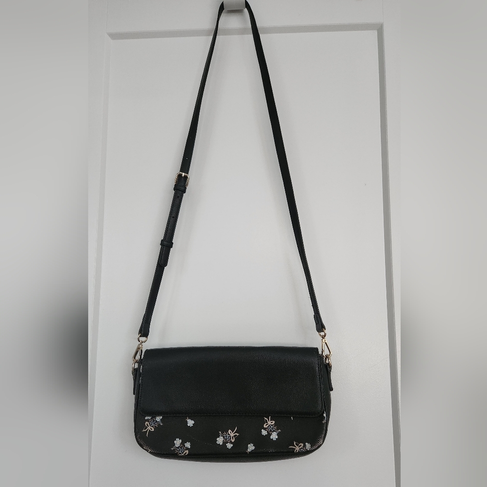 Sleek Black Crossbody Bag with Silver Accents